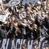 Oakland Raiders fans in the Black Hole cheer during the first quarter of their NFL football game against the New England Patriots in Oakland, Calif., Sunday, Oct. 2, 2011.