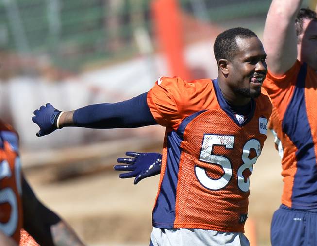 ﻿﻿﻿﻿ Denver Broncos' Von Miller stretches during an NFL football organized team activity, Wednesday, May 28, 2014, in Englewood, Colo.