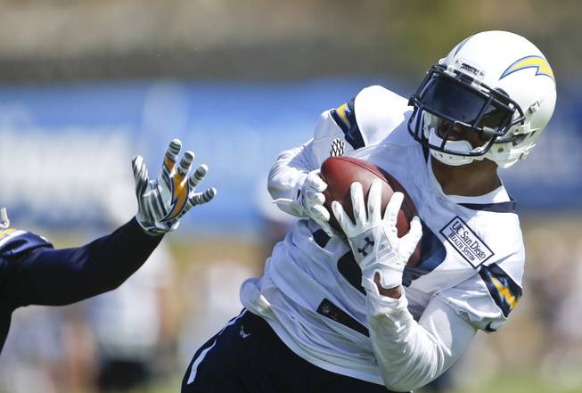 San Diego Chargers wide receiver Keenan Allen hauls in a long pass during seven-on-seven drills at a NFL football training camp Thursday, July 24, 2014, in San Diego.