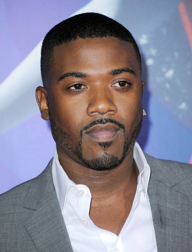 In this Aug. 16, 2014, file photo, Ray J attends the Los Angeles premiere of "Sparkle" at Grauman's Chinese Theatre in Los Angeles. On Tuesday, Aug. 19, 2014, the singer pleaded not guilty to groping a woman at a Beverly Hills hotel bar and resisting arrest afterward.