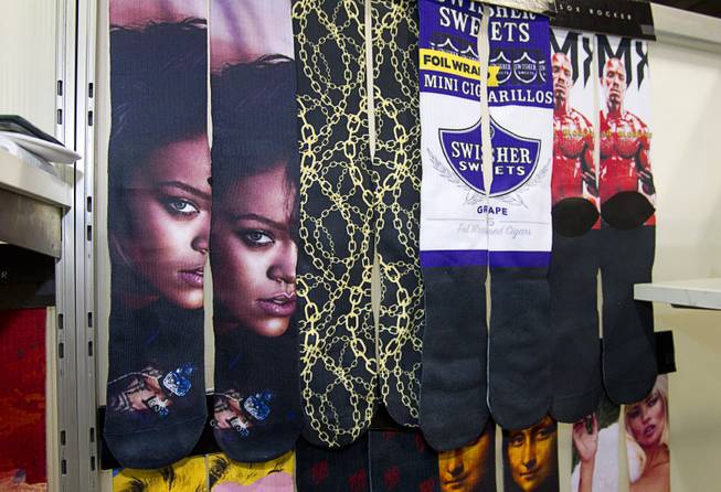 Socks featuring the image of Rihanna are displayed at the Sox Rocker booth during the Modern Assembly fashion trade show at the Sands Expo & Convention Center Wednesday, Aug. 20, 2014. The show is a collection of six shows: The Accessories Show, Agenda, Capsule, Liberty, Mrket, and Stitch.