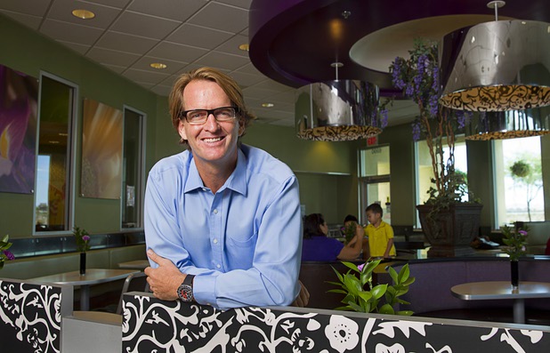 James Vance, owner-operator of eight local McDonald's franchises, poses in his McDonald's at 6990 S. Rainbow Blvd. Wednesday, Aug. 20, 2014. Vance is also president of the Greater Las Vegas McDonalds Owner Operators Association. Since 1999, the local effort has awarded more than $3.1 million in Ronald McDonald House Charities scholarships, helping more than 1,300 Southern Nevada high school students.