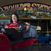 Boulder Station employee Pat Hadlett atop her ATV which she loves to ride when not a guest services ambassador for slots on Friday, August 15, 2014.  She is pleased to be helping the casino in celebrating its 20th year anniversary.