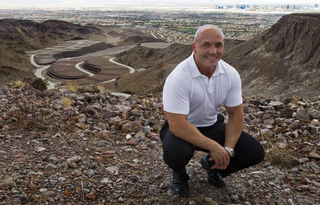Ascaya sales manager Darin Marques is atop the mountain-mansion development, where reservations now being accepted to begin the purchasing process, on Wednesday, Aug. 20, 2014, in Henderson.