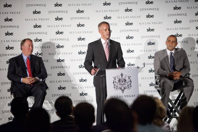 Rob Oseland, center, president of SLS Las Vegas, speaks during a press conference with Terry Fancher, left, executive managing director at Stockbridge, and Sam Nazarian, CEO at SBE Entertainment, at SLS Las Vegas on Friday, Aug. 22, 2014.