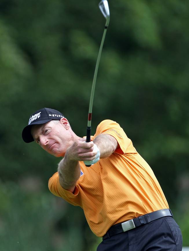 Jim Furyk hits from the fifth fairway during third round play at the Barclays golf tournament Saturday, Aug. 23, 2014, in Paramus, N.J.