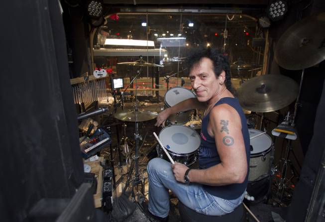 Drummer Alan Childs poses before a performance of "Rock Of Ages" at the Venetian Wednesday, Aug. 27, 2014. 