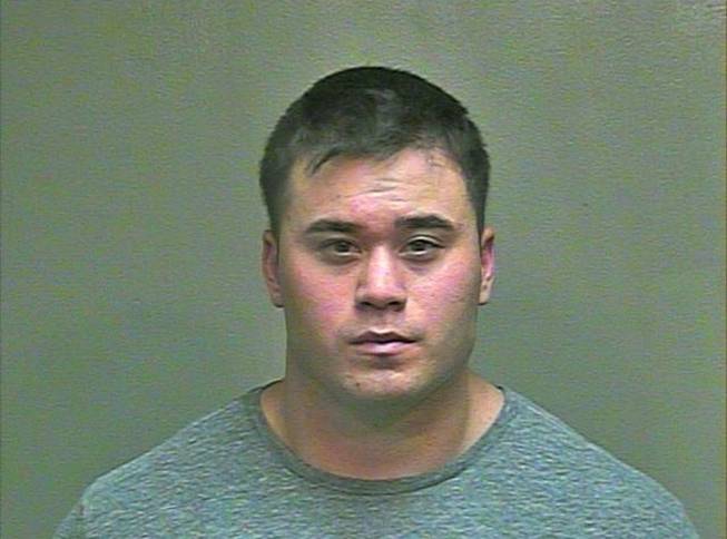FILE - This Aug. 21, 2014 file photo made available by the Oklahoma County Sheriff's Office shows Daniel K. Holtzclaw. The 27-year-old Oklahoma City police officer was charged Friday, Aug. 29, 2014, with 16 counts including rape and sexual battery after he was accused of assaulting at least seven women while on patrol. 