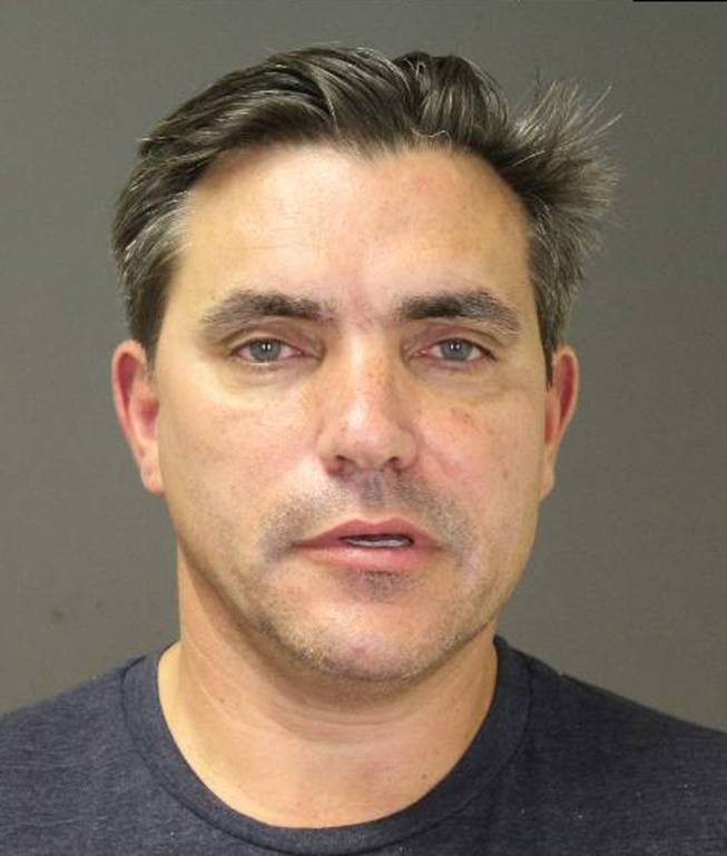 This photo provided by the Southampton Town Police Department on Long Island shows celebrity chef Todd English, 54, after his arrest early Sunday morning, Aug 31, 2014, in Southampton, N.Y., where he was charged with driving while intoxicated. Authorities say he posted $1,500 bail at Southampton Town Justice Court.