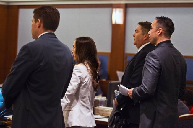 Lawyers stand and address the judge as Jon Koppenhaver appears briefly in court facing felony charges, including assault with a deadly weapon, lewdness, coercion and multiple counts of battery on Wednesday, September 3, 2014.  L.E. Baskow
