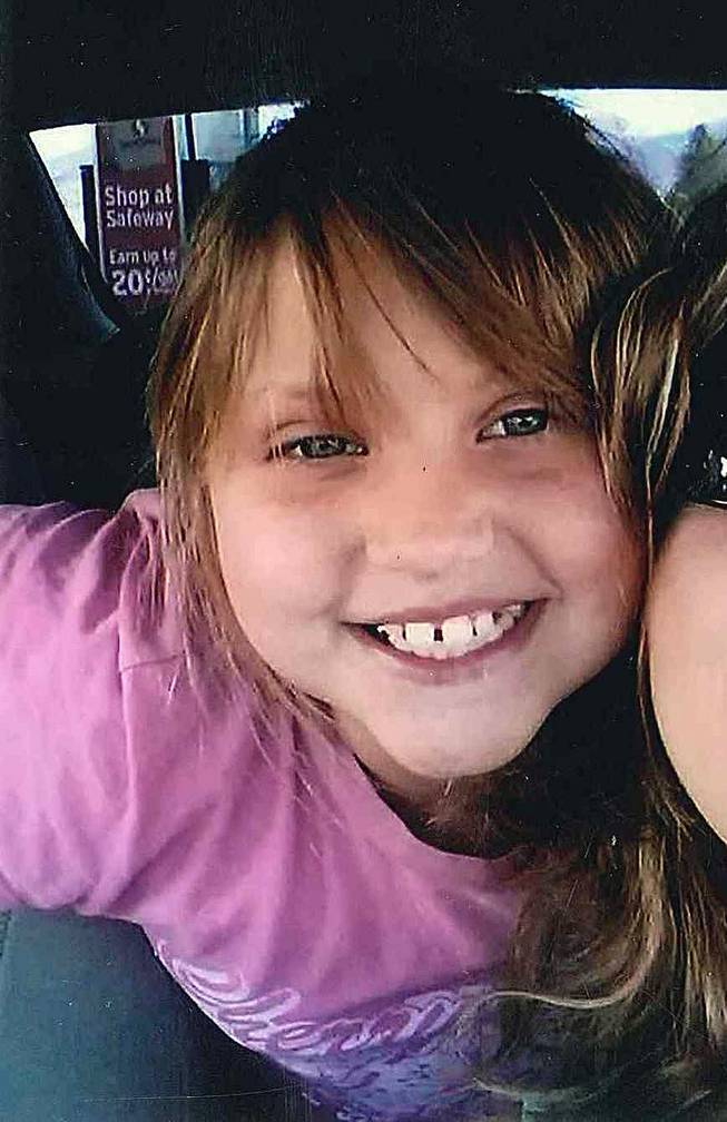 This undated file photo provided by the Bullhead City, Ariz., Police Department shows Isabella “Bella” Grogan-Cannella, an 8-year-old Bullhead City girl who was reported missing on Sept. 2, 2014, and found dead a day later.