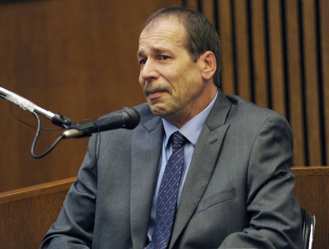 FILE - In this Aug. 4, 2014 file photo, Theodore Wafer, of Dearborn Heights, Mich., testifies in his own defense during his trial for the Nov. 2, 2013, killing of Renisha McBride in Detroit. Wafer was sentenced WednesdaySept. 3, 2014 to at least 17 years in prison for killing an unarmed woman who appeared on his porch before dawn. 