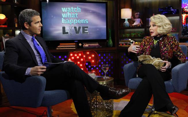 COMMERCIAL IMAGE - In this photograph taken by AP Images for Bravo, Andy Cohen, left, talks with Joan Rivers on Bravo's "Watch What Happens Live" show on Thursday, Feb. 16, 2012, in New York. 