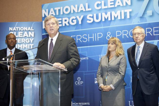 Secretary of Agriculture Tom Vilsack speaks during a press conference announcing the Fulcrum BioEnergy Inc. Sierra BioFuels project during the National Clean Energy Summit 7.0: Partnership & Progress at Mandalay Bay Resort on Thursday, Sept. 4, 2014. Also pictured is Senate Majority Leader Harry Reid, Myron Gray, president of U.S. operation for UPS and Lydia Ball, executive director of Clean Energy Project. 