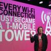 T-Mobile CEO John Legere speaks at a T-Mobile announcement in San Francisco, Wednesday, Sept. 10, 2014. T-Mobile will sell more than 100 smartphone models with a built-in feature that taps into Wi-Fi networks to make phone calls and send texts when customers can't connect to the wireless carrier's cellular network. 