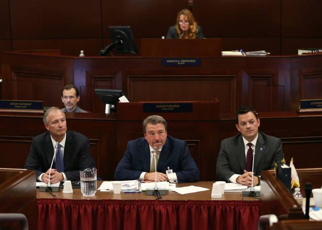 Steve Hill of the Nevada Office of Economic Development, Tony Sanchez of Nevada Energy and Paul Thomsen of the Nevada Office of Energy answer questions from lawmakers during a special session at the Nevada Legislature on Wednesday, Sept. 10, 2014, in Carson City.