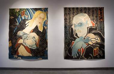 “AIDS Series/ Mother and Child,” left, and “AIDS Series/Father and Son” by Masami Teraoka are part of the Ghost Dogs: Japanese-American Legends exhibit in the Donna Beam Fine Art Gallery at UNLV Monday, Sept. 22, 2014. The exhibit closes Saturday, Sept. 27.