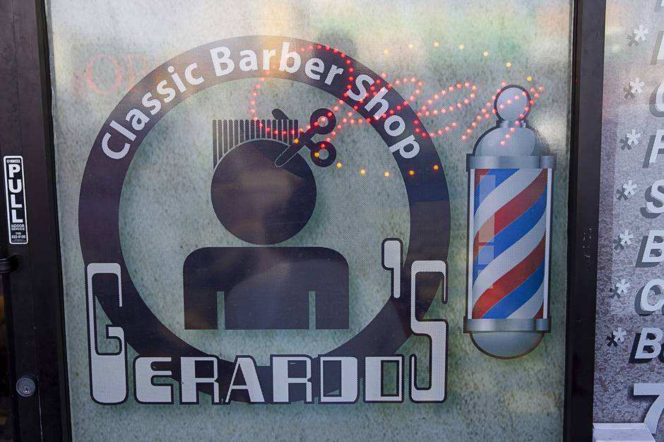 Gerardo's Classic Barber Shop, 3869 Spring Mountain Rd, Las Vegas, NV.  While the pricing sign is in Engl…