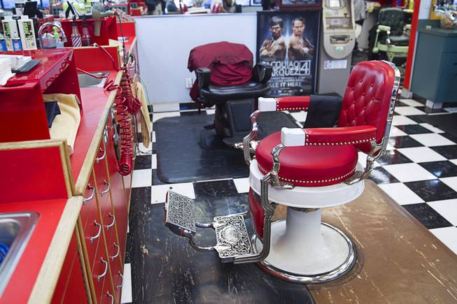 An antique barber shop from Chicago is shown at Geraldo's Classic Barber Shop, 3869 Spring Mountain Rd., Sunday Sept. 21, 2014. Mobster Al Capone is reputed to have had a haircut in the chair.