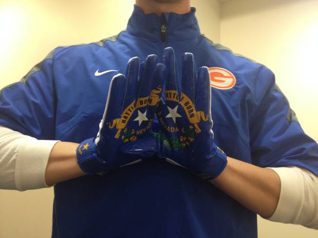 The Bishop Gorman High football team will wear gloves with a design based on the Nevada flag for its game against St. John Bosco.