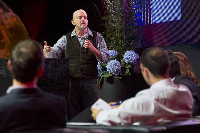 R. Blank of EM Sheild makes his pitch during a  "Get Started Las Vegas" event at the Palms' Rain nightclub Thursday Sept. 25, 2014. Cox Business sponsored the "Shark Tank"-style event where a handful of start-ups and business owners competed for a $15,000 prize package.