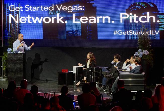 David Leibner, left, of It's On Me makes a pitch during a "Get Started Las Vegas" event at the Palms' Rain nightclub Thursday Sept. 25, 2014. Cox Business sponsored the "Shark Tank"-style event where a handful of start-ups and business owners competed for a $15,000 prize package.