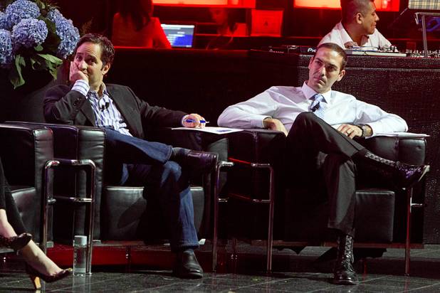 Judges Josh Linkner, left and Brad Howard listen to a pitch during a "Get Started Las Vegas" event at the Palms' Rain nightclub Thursday Sept. 25, 2014. Cox Business sponsored the "Shark Tank"-style event where a handful of start-ups and business owners competed for a $15,000 prize package.