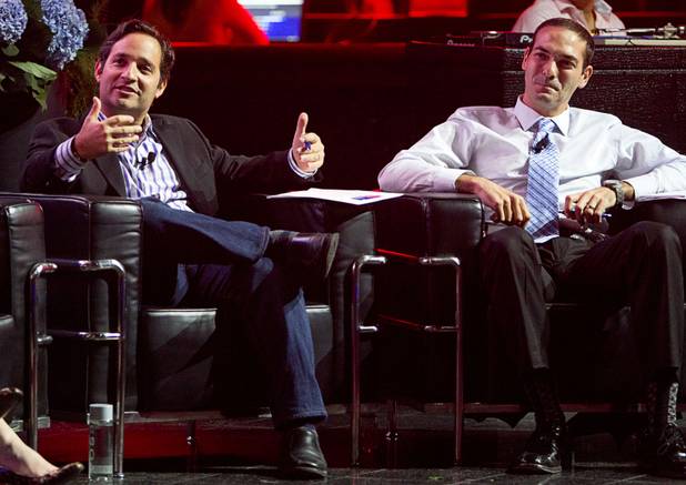 Judge Josh Linkner, left, asks a question to a competitor as judge Brad Howard looks on during a "Get Started Las Vegas" event at the Palms' Rain nightclub Thursday Sept. 25, 2014. Cox Business sponsored the "Shark Tank"-style event where a handful of start-ups and business owners competed for a $15,000 prize package.