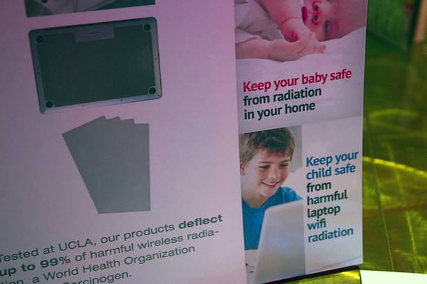 A display advertises EM Shield products during a "Get Started Las Vegas" event at the Palms' Rain nightclub Thursday Sept. 25, 2014. The shields protect consumers from wireless radiation. Cox Business sponsored the "Shark Tank"-style event where a handful of start-ups and business owners competed for a $15,000 prize package.