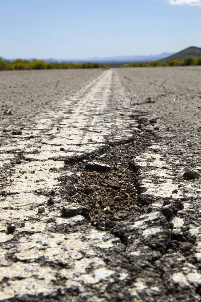 The runway at the Searchlight Airport is shown in disrepair in Searchlight, Nev. Sunday Sept. 28, 2014.