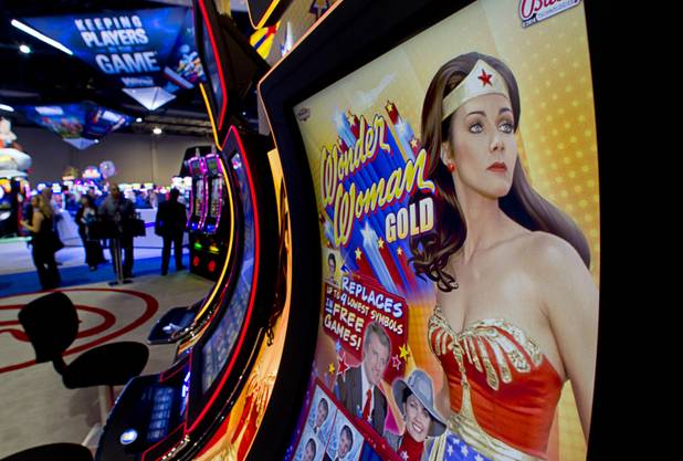 A Wonder Woman slot machines are displayed in the Bally Technologies booth during the final day of the Global Gaming Expo (G2E) at the Sands Expo Center Thursday, Oct. 2, 2014.