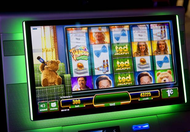 A slot machine based on the movie "Ted" is displayed during the Global Gaming Expo (G2E) at the Sands Expo Center Thursday, Oct. 2, 2014. The 2012 comedy from Seth MacFarlane features a raunchy, beer-swilling teddy bear.