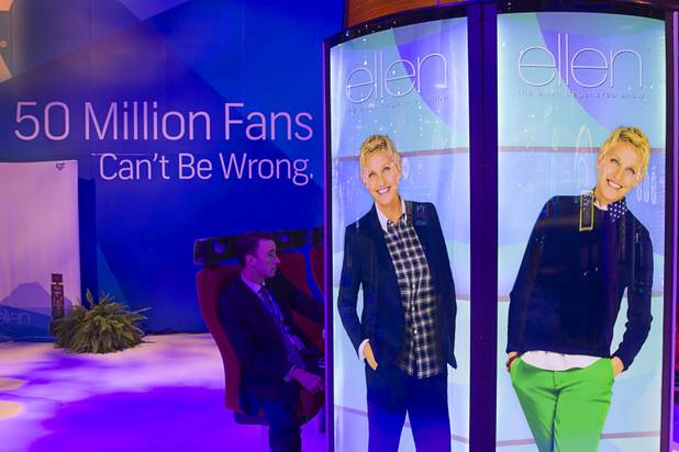 A man plays an Ellen slot machine at the IGT booth during the Global Gaming Expo (G2E) at the Sands Expo Center Thursday, Oct. 2, 2014.
