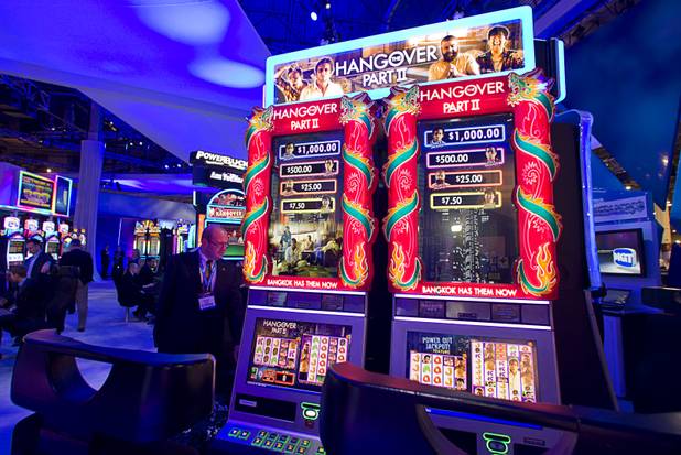 Hangover Part II slot machines are displayed at the IGT booth during the Global Gaming Expo (G2E) at the Sands Expo Center Thursday, Oct. 2, 2014.