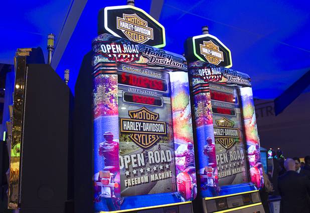 Harley Davidson-themed slot machines are displayed at the IGT booth during the Global Gaming Expo (G2E) at the Sands Expo Center Thursday, Oct. 2, 2014.