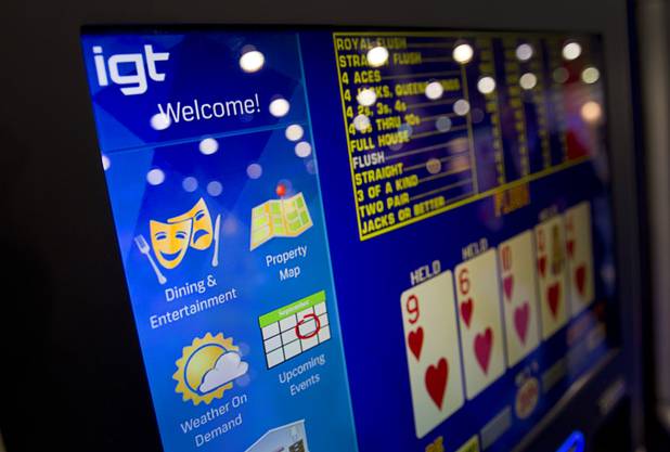 An information bar is shown on the side of an IGT video poker machine during the Global Gaming Expo (G2E) at the Sands Expo Center Thursday, Oct. 2, 2014.
