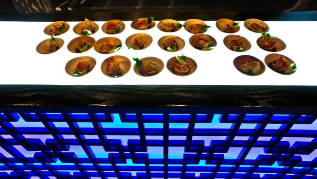 Hakkasan features poached Beijing dumpling in homemade vinegar during LuckyRice Las Vegas Feast at Boulevard Pool on Saturday, Oct. 4, 2014, in the Cosmopolitan.