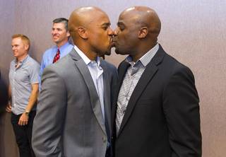 Sherwood Howard and State Sen. Kelvin Atkinson, D-North Las Vegas, kiss after Atkinson publicly proposed to Howard during a celebration at The Gay and Lesbian Community Center of Southern Nevada (The Center) Tuesday, Oct. 7, 2014. People gathered to celebrate a ruling by the 9th U.S. Circuit Court of Appeals that overturned Nevada's prohibition on gay marriage.