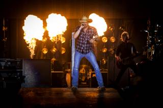 Jason Aldean performs during the third and final night of the Route 91 Harvest country music festival Sunday, Oct. 5, 2014, at MGM Resorts Village.