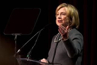 Former Secretary of State Hillary Rodham Clinton delivers the keynote address during the the UNLV Foundation Annual Dinner at the Bellagio Monday, Oct. 13, 2014.