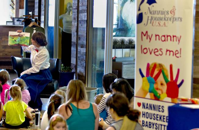 Nannies and Housekeepers USA present a twice monthly "Story Time with Mary Poppins" program, where a Mary Poppins character reads and sings to children at Tivoli Village on Thursday, October 9, 2014.