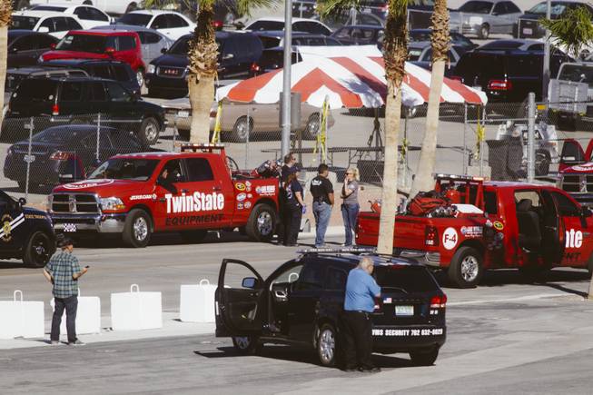 Emergency vehicles on scene where a truck caught on fire in the parking lot of the Las Vegas Motor Speedway during the Red Bull Air Race on October 12, 2014.