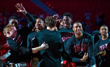 UNLV basketball players gather for the scarlet and gray exhibition, which is the Rebels’ version of midnight madness, at the Thomas & Mack Center on Thursday, Oct. 16, 2014.