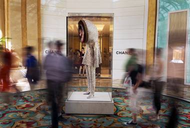 A new Nick Cave piece entitled “Soundsuit” was bought by the Bellagio as part of its permanent collection and displayed outside the Chanel store on Wednesday, October 15, 2014. It is composed of fabric, burins, antique sifter and wire.  L.E. Baskow.