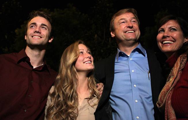 Sen. Dean Heller, R-Nev., with his son Harris, from left, daughter Emmy, and wife Lynne celebrates his victory at the Palazzo in Las Vegas on Tuesday, November 6, 2012.