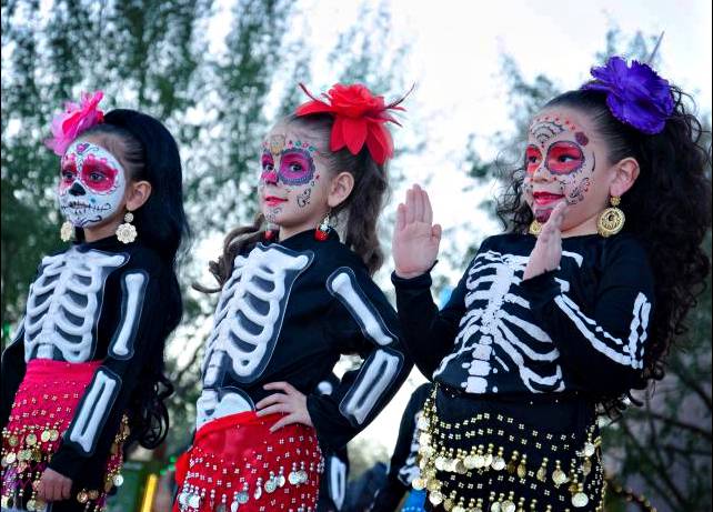 Children perform at the annual Day of the Dead celebration at Springs Preserve. 