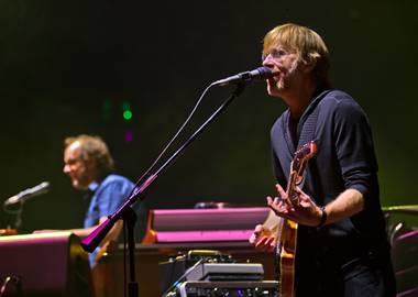 Trey Anastasio of Phish sings during the band’s concert at MGM Grand Garden Arena on Halloween night on Friday, Oct. 31, 2014.