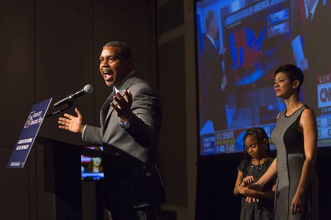Congressman Steven Horsford (D-Nev) is joined by his wife Sonya and daughter Ella, 7, as he speaks during an election night party for Democrats at the MGM Grand Tuesday, November 4, 2014.