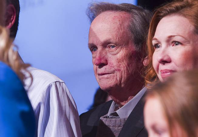 Former Congressman James Bilbray joins with family members on stage as his daughter Erin, a congressional candidate, gives her concession speech during an election night party for Democrats at the MGM Grand Tuesday, November 4, 2014.