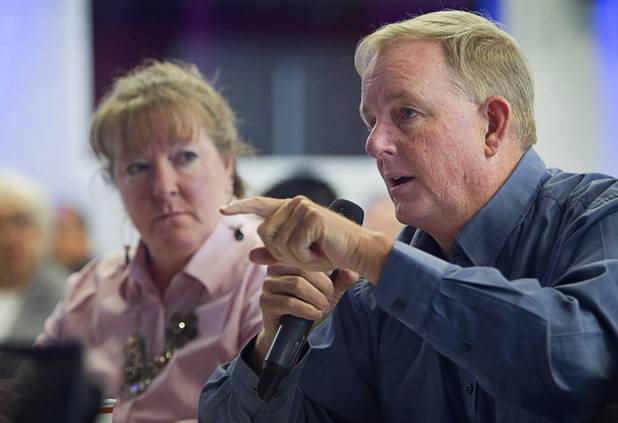 Steve Curtis of the Desert Research Institute, asks what industry can do to support STEM (science, technology, engineering, and mathematics) education during "Cracking the Code on STEM:  A People Strategy For Nevada's Economy" at the Innevation Center Wednesday, Nov. 12, 2014. Kathy Lauckner listens at left. Representatives from the Brookings Mountain West discussed a report regarding the STEM economy and education in Nevada.